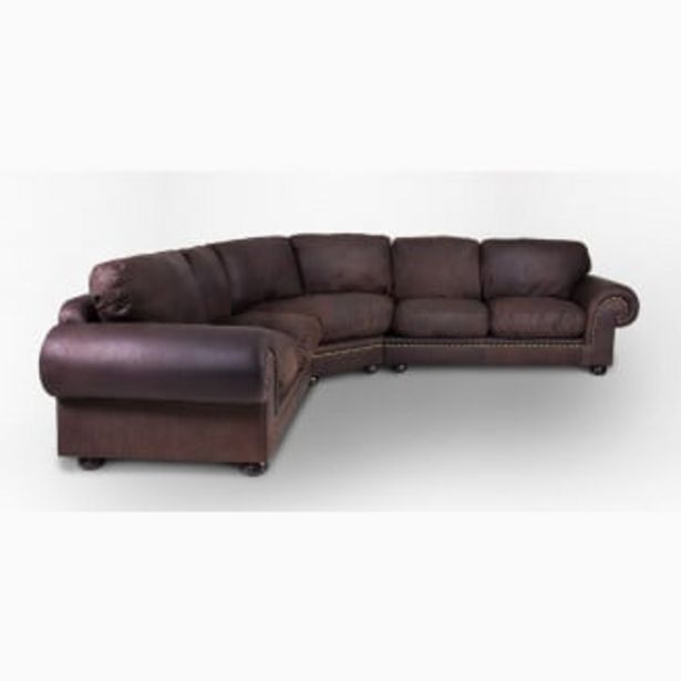 Afrique leather corner couch, with studs offer at Coricraft