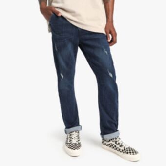The FIX Men's dark wash tapered denim jeans offer
