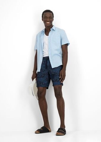 Woolworths Leaf print slim fit longer length swim shorts offer