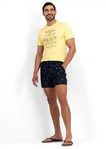 Tropical print slim fit mid length swim shorts