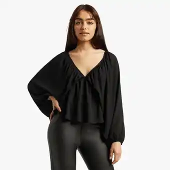 The FIX Women's black woven top with cape sleeve offer