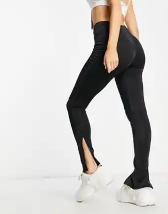 Asos Asos design slinky legging with split hem in black offer