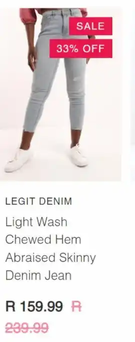 Light wash chewed hem abraised skinny denim jean