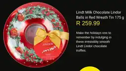 Woolworths Lindt Milk Chocolate Lindor Balls in Red Wreath Tin offer