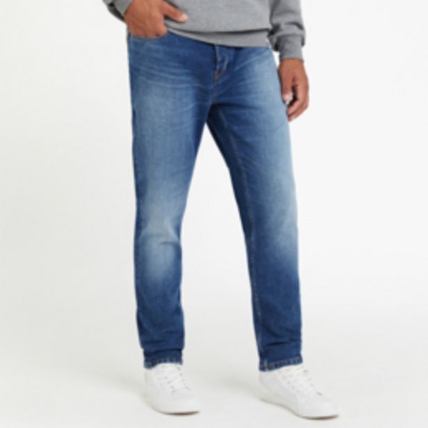 Rj medium wash tapered jean offer at Markham