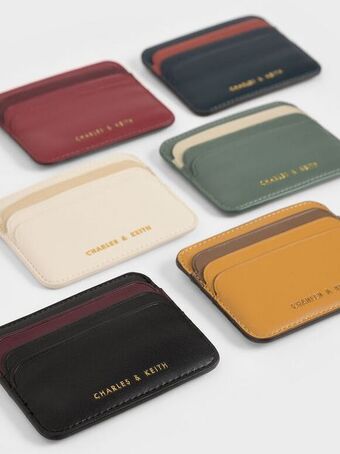 Two-tone multi-slot card holder
- black