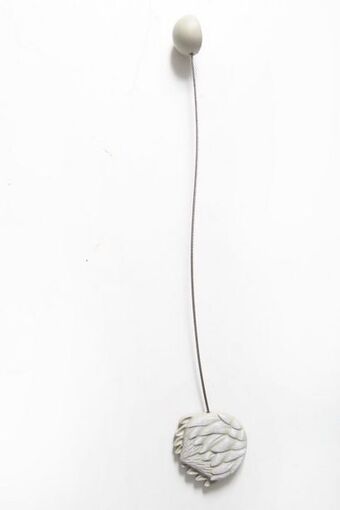 Magnetic tie back
